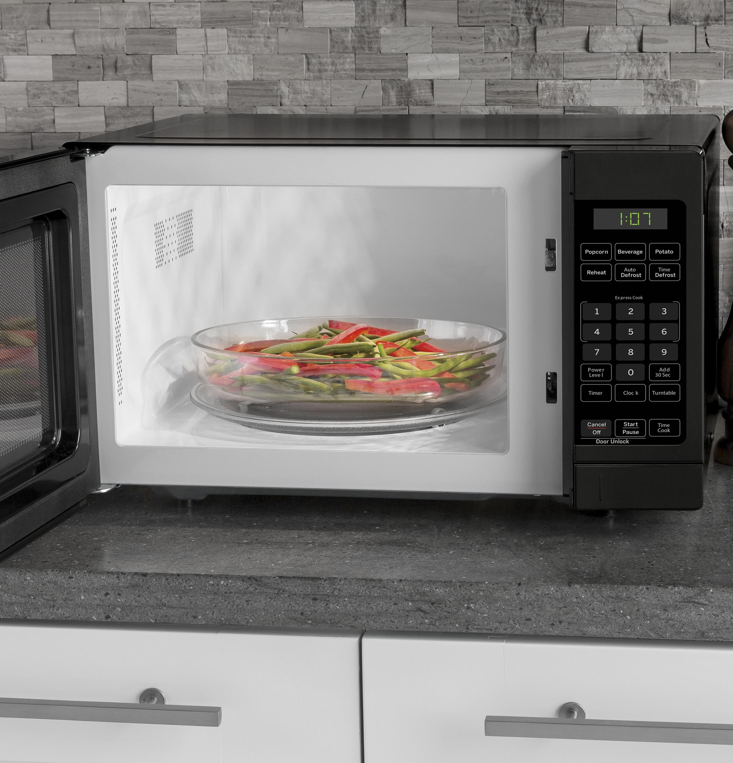 Ge Appliances GCHK07N1WBB Ge® 0.7 Cu. Ft. Spacemaker® Countertop Microwave Oven