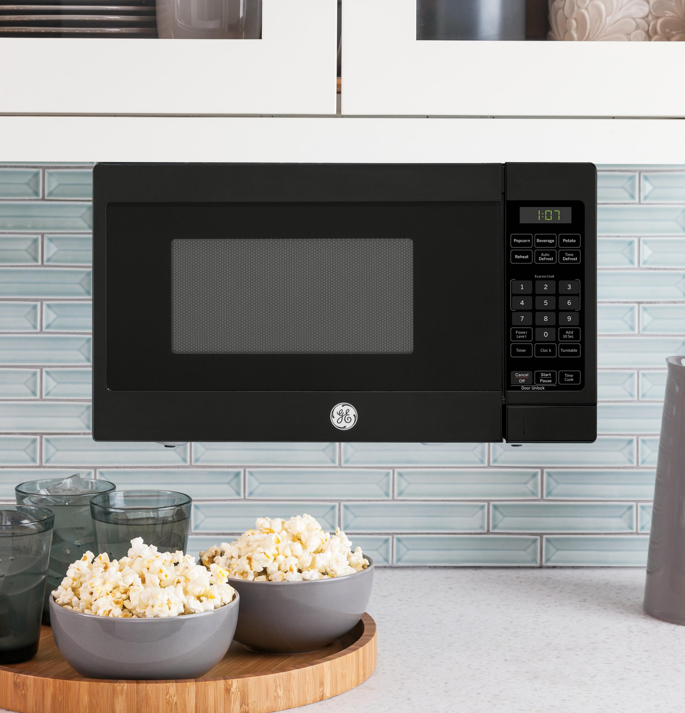 Ge Appliances GCHK07N1WBB Ge® 0.7 Cu. Ft. Spacemaker® Countertop Microwave Oven