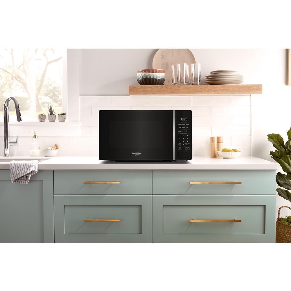 Whirlpool WMCS3018RB 0.7 Cu. Ft. Black Countertop Microwave With Steam Clean - 700 Watt